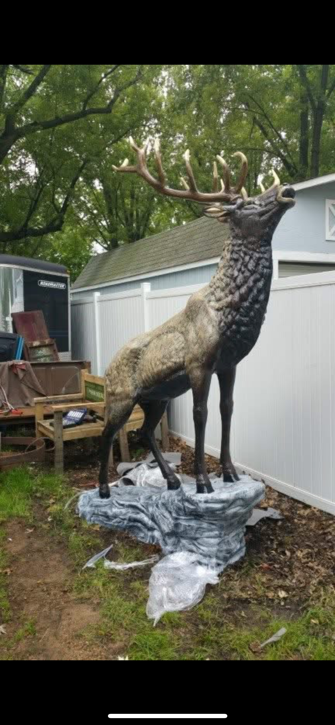 Elk Statue on Rock