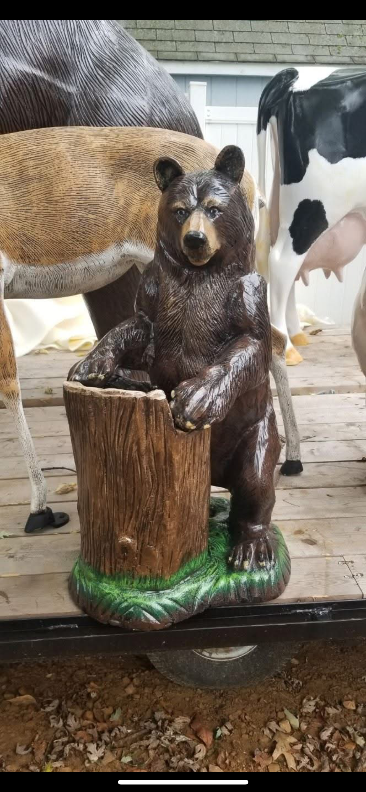 Bear holding log (planter)