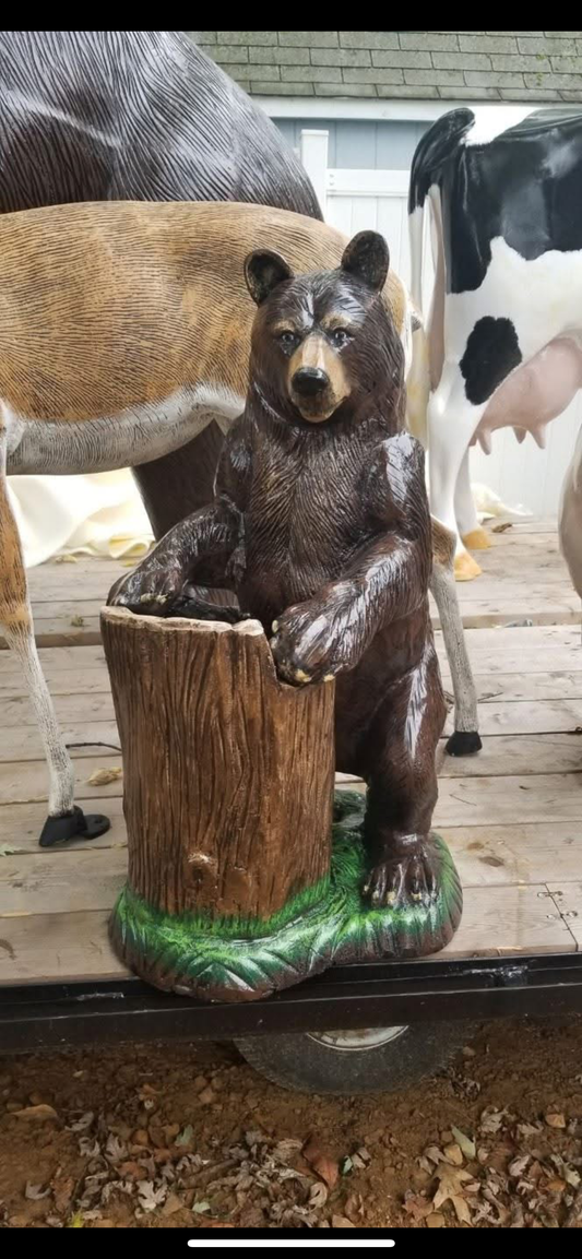 Bear holding log (planter)